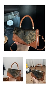 Detail of crocodile pattern flap and golden hardware on brown dual-use handbag