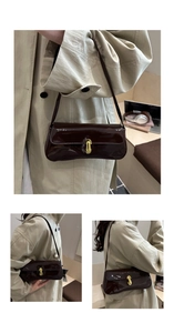 Detail einer dunkelbraunen Lackleder-Schultertasche mit goldener Oval-Metallschnalle