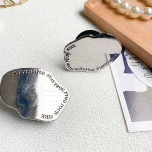 Polished silver mirror phone socket with Stay Simple Stay True engraved quote detail