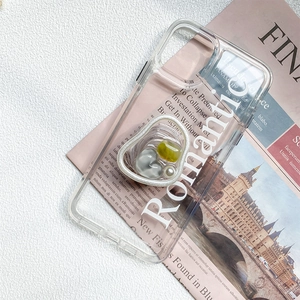 Detail of transparent TPU phone case with 3D romantic heart filled with pearls and gems