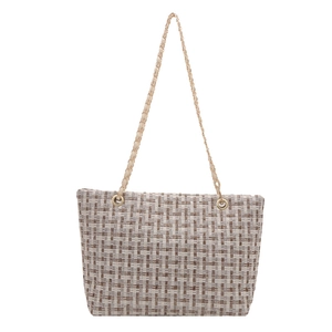 Checkered tweed tote bag with gold chain strap in brown and beige woven pattern