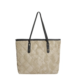 Quilted tote bag with camo print and black handles for daily casual use