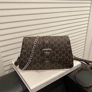 Retro brown crossbody bag with silver chain and all-over letter print on white background