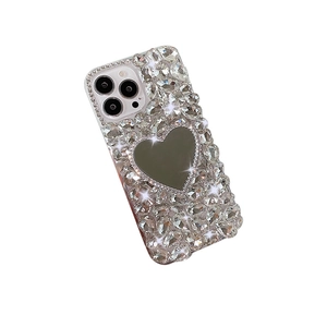 Luxury rhinestone phone case for iPhone with a heart-shaped makeup mirror back