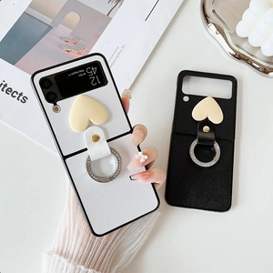 Stereo heart Galaxy Z Flip3 case with diamond ring holder in black and white leather