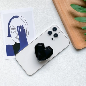 3D geometric black heart-shaped collapsible phone grip and stand for smartphones