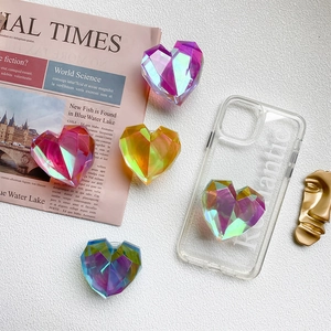 Colorful heart-shaped holographic phone grip with 3D geometric cut surface and gradient