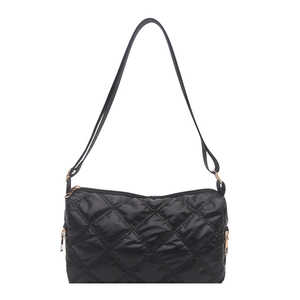 Quilted black puffer crossbody bag with diamond stitching and adjustable strap