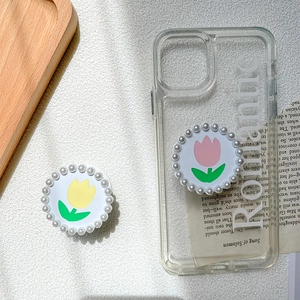 Support de téléphone tulipe rose avec bordure perle sur coque transparente