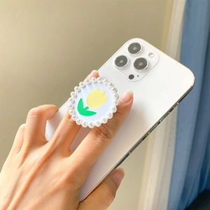 Support de téléphone tulipe minimaliste avec bordure en perles élégante sur base blanche