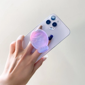 Macro detail of a fish-shaped laser resin phone grip with purple gradient design