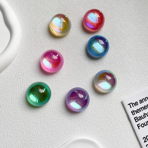 Macro shot of 7 aurora colorful crystal cabochons with flat back for phone stand DIY