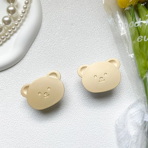 Cute golden bear collapsible phone socket stand with matte metallic finish for desks