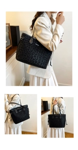 Detail view of large leopard print tote bag with Creative Cat embossed text and zip closure