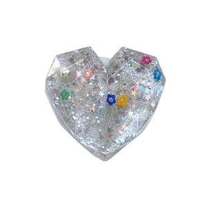 Glitter heart phone socket with holographic stars, resin flowers and pearl decoration