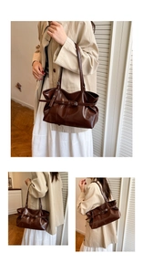 Close-up of deep brown glossy leather tote bag with stylish buckle and smooth texture