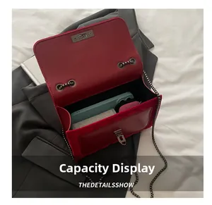 Internal view of the red velvet crossbody bag showing storage capacity for daily essentials
