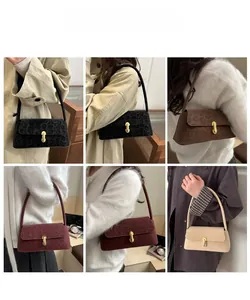 Close-up showing various colors and textures of fashion leopard shoulder bags with metal buckles