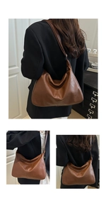 Détails d'un sac hobo en cuir marron caramel avec bandoulière réglable et forme souple