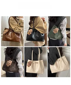 Detailed views of high-capacity tote bags in six colors with teddy bear charms