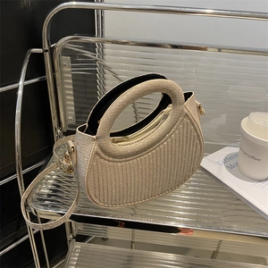 Elegant champagne gold sequin handbag with arc handle and detachable shoulder strap