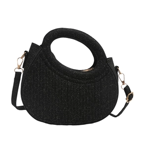 Sparkly black crescent handbag with circular handle and detachable shoulder strap
