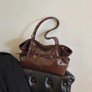 Retro dark brown pleated shoulder bag with glossy patent leather and metal buckles