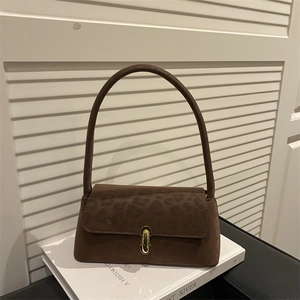 Deep brown retro shoulder bag with leopard pattern flap and golden capsule metal lock
