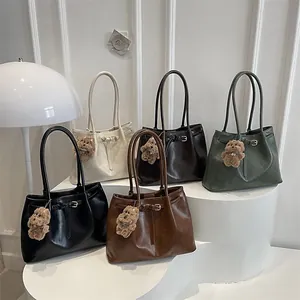 Fashionable large capacity leather tote bags for women in five colors with bear charm