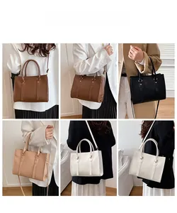 Detail showing various colors of fashion tote bags with crossbody straps and top handles