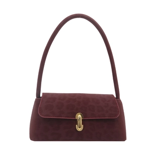 Dark red leopard print shoulder bag with gold metal clasp and cylindrical long strap