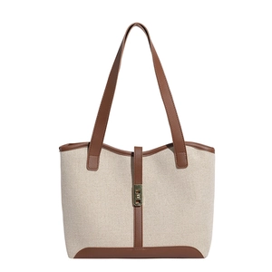 Retro contrast color canvas tote bag with brown leather trim and gold twist lock