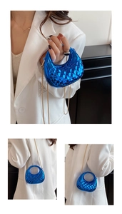 Close-up of electric blue metallic quilted mini bag with golden chain strap for women