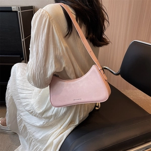 Minimalist light pink baguette shoulder bag for women with sleek matte leather finish