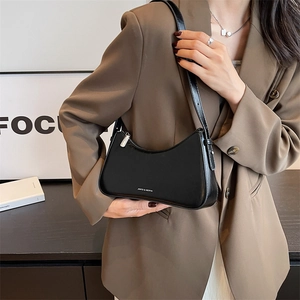 French style minimalist black hobo shoulder bag with white logo and silver hardware