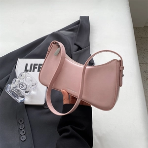Pink crescent underarm bag in smooth leather with zipper and silver hardware details