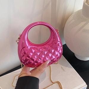 Fashionable rose red acrylic mini bag with quilted pattern and gold chain strap