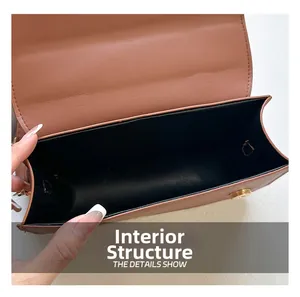 Detailed interior view of the brown leather crossbody bag with magnetic closure