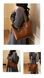 Detailed macro view of vintage brown tote bag texture and fashion leather lettering