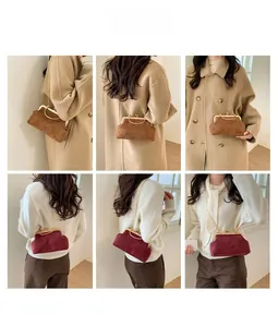 Detail shots of vintage-style suede kiss-lock bags in brown and burgundy with chain straps