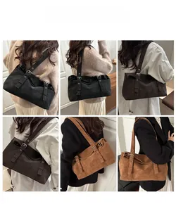 Detailed views of vintage faux suede tote bag with adjustable metal buckle strap