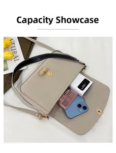 Internal view showing capacity of a beige crossbody bag with smartphone and makeup