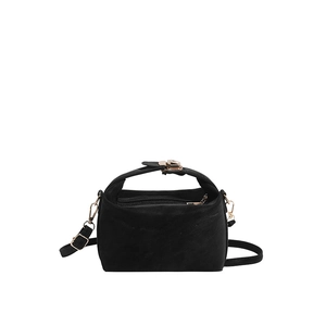 Minimalist black suede underarm bag with gold hardware and adjustable strap for women