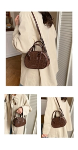 Detail of leopard print small round handbag with Creative Cat logo and brown strap