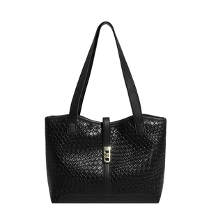 Large black woven leather tote bag for women with gold hardware and shoulder straps