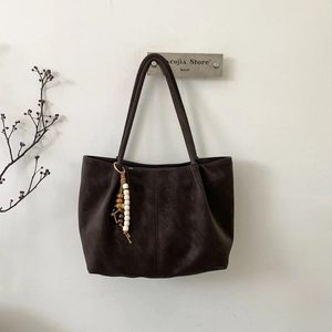 Chic dark brown faux suede tote bag with zipper and wooden bead tassel decoration