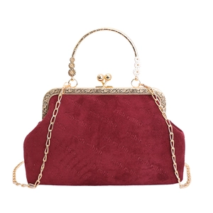 Vintage burgundy suede shell bag with gold metal frame and rich rabbit embossing