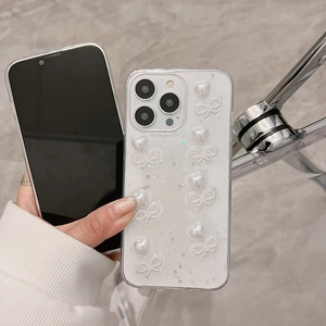 Coque iPhone translucide à paillettes avec motifs 3D de cœurs et nœuds perlés