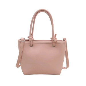 Elegant pale pink bucket bag with knotted handles and adjustable crossbody straps