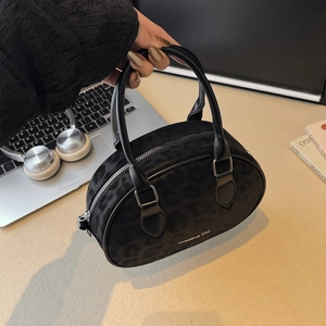 Minimalist black leopard print handbag with silver zipper for daily commute
